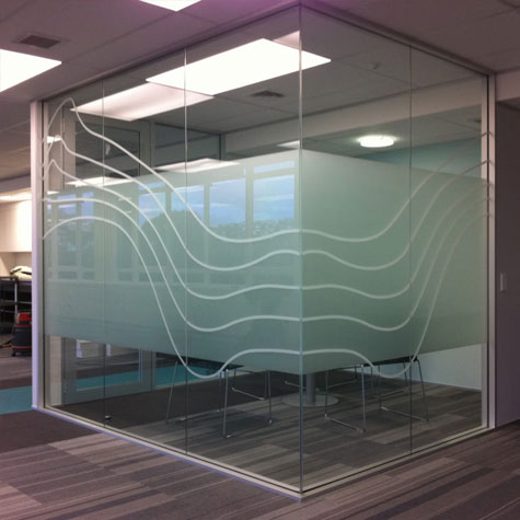 Office meeting room with tinted glass walls